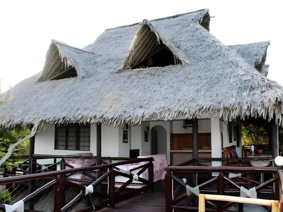 Changani Beach Cottages image #6